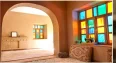 فضای داخلی با پنجره های رنگی اقامتگاه بوم گردی طارونه پارس - فارس - خفر